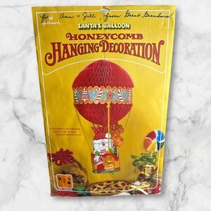 Vintage Hallmark honeycomb hanging Santa in hot air balloon paper decor